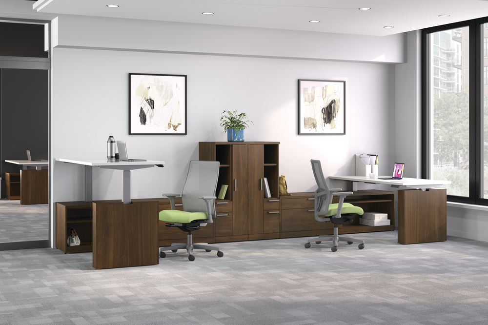 office with two chairs and two adjustable desks